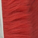 Tapis rond à longs poils rouge detail 1